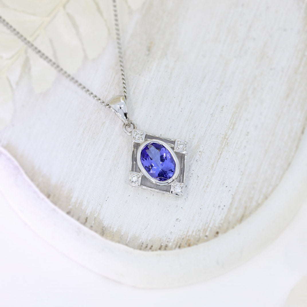 9ct White Gold Tanzanite & Diamond Pendant on a 9ct 16Inch Chain