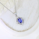 9ct White Gold Tanzanite & Diamond Pendant on a 9ct 16Inch Chain
