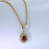 9ct Yellow Gold Ruby & Diamond Halo Pendant With 18" 9ct Chain