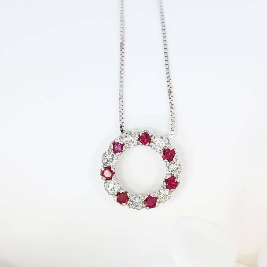 9ct White Gold Circle Pendant with Claw Set Rubies & Diamonds