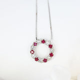 9ct White Gold Circle Pendant with Claw Set Rubies & Diamonds