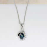 9ct White Gold Oval Sapphire & Diamond Pendant on a 9ct Gold 20" Chain