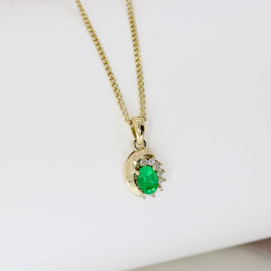 9ct Yellow Gold Oval Emerald Pendant With Claw Set Diamonds on a 9ct 18" Chain