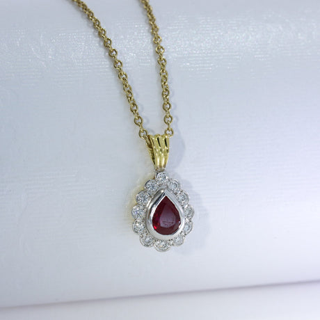 18ct Gold Ruby & Diamond Cluster Pendant on a 20inch 9ct Gold Chain