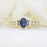 18ct Yellow Gold Oval Claw Set Sapphire & Channel Set Diamond Ring