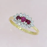 18ct Gold Ruby & Diamond Cluster Ring Approx Diamond Weight: 0.25ct
