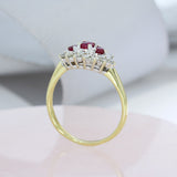 18ct Gold Ruby & Diamond Cluster Ring Approx Diamond Weight: 0.25ct