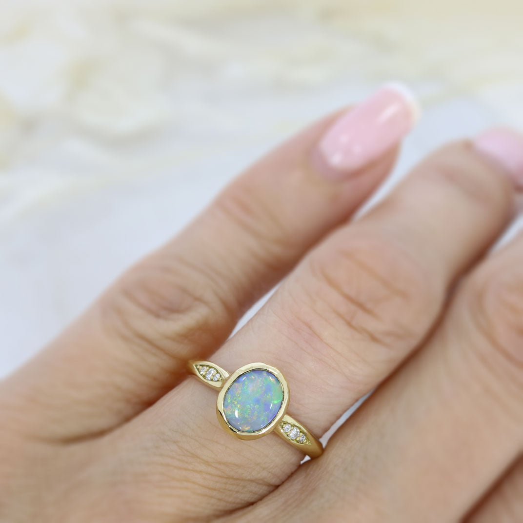 18ct Yellow Gold Oval Rubover Set Opal Dress Ring with Pave Set Diamond Shoulders