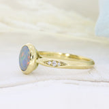 18ct Yellow Gold Oval Rubover Set Opal Dress Ring with Pave Set Diamond Shoulders