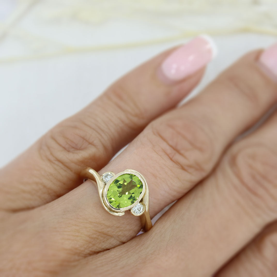 9ct Yellow Gold Oval Rubover Set Peridot & Round Diamond Dress Ring