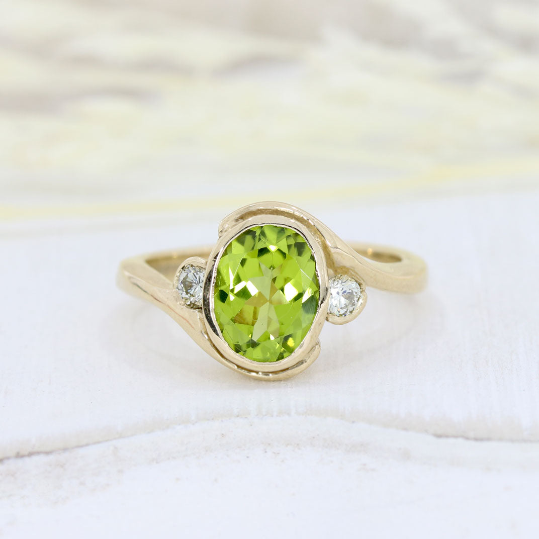 9ct Yellow Gold Oval Rubover Set Peridot & Round Diamond Dress Ring