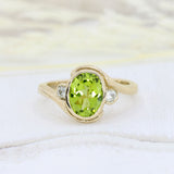 9ct Yellow Gold Oval Rubover Set Peridot & Round Diamond Dress Ring