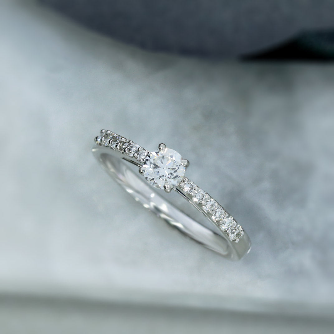 Platinum Diamond Solitaire Ring With Diamond Set Shoulders Total 0.50ct