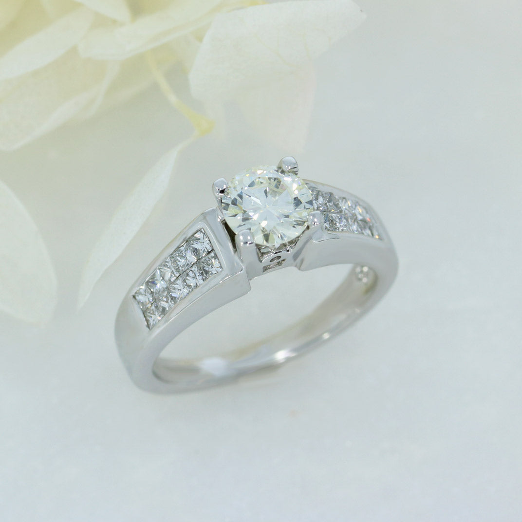 Pre Owned 18ct Brilliant Cut Diamond Solitaire Ring with Princess Cut Diamond Shoulders Total 1.30ct