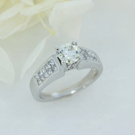 Pre Owned 18ct Brilliant Cut Diamond Solitaire Ring with Princess Cut Diamond Shoulders Total 1.30ct