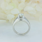 Pre Owned 18ct Brilliant Cut Diamond Solitaire Ring with Princess Cut Diamond Shoulders Total 1.30ct