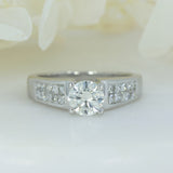 Pre Owned 18ct Brilliant Cut Diamond Solitaire Ring with Princess Cut Diamond Shoulders Total 1.30ct