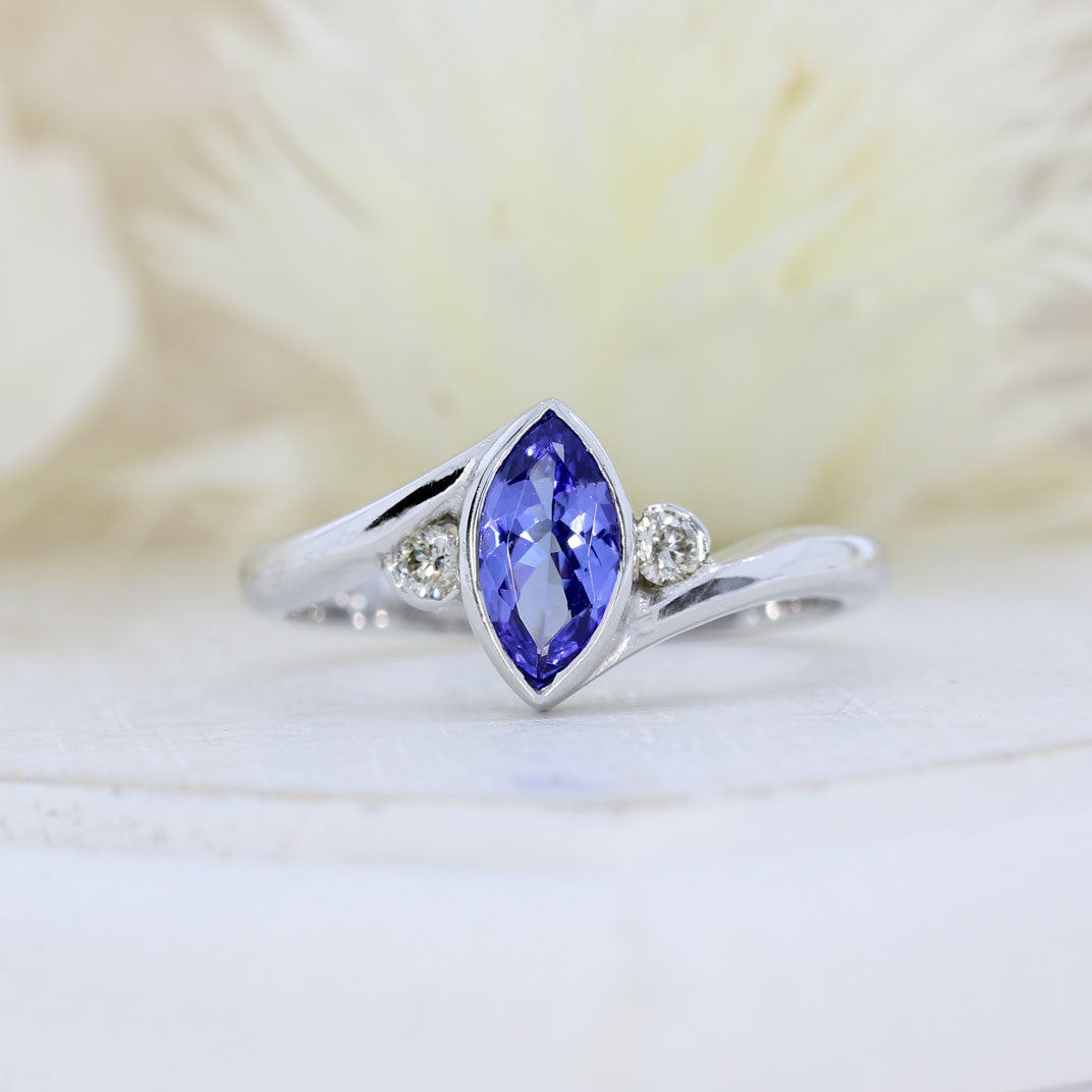 9ct White Gold Rubover Set Marquise Shape Tanzanite & Diamond Ring