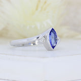 9ct White Gold Rubover Set Marquise Shape Tanzanite & Diamond Ring