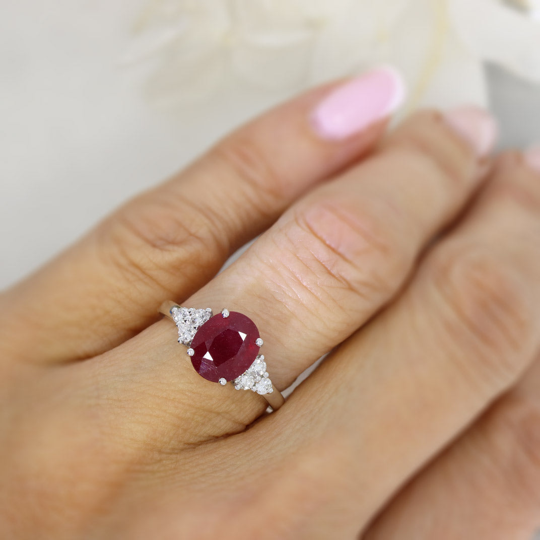 9ct White gold oval glass filled ruby and diamond dress ring