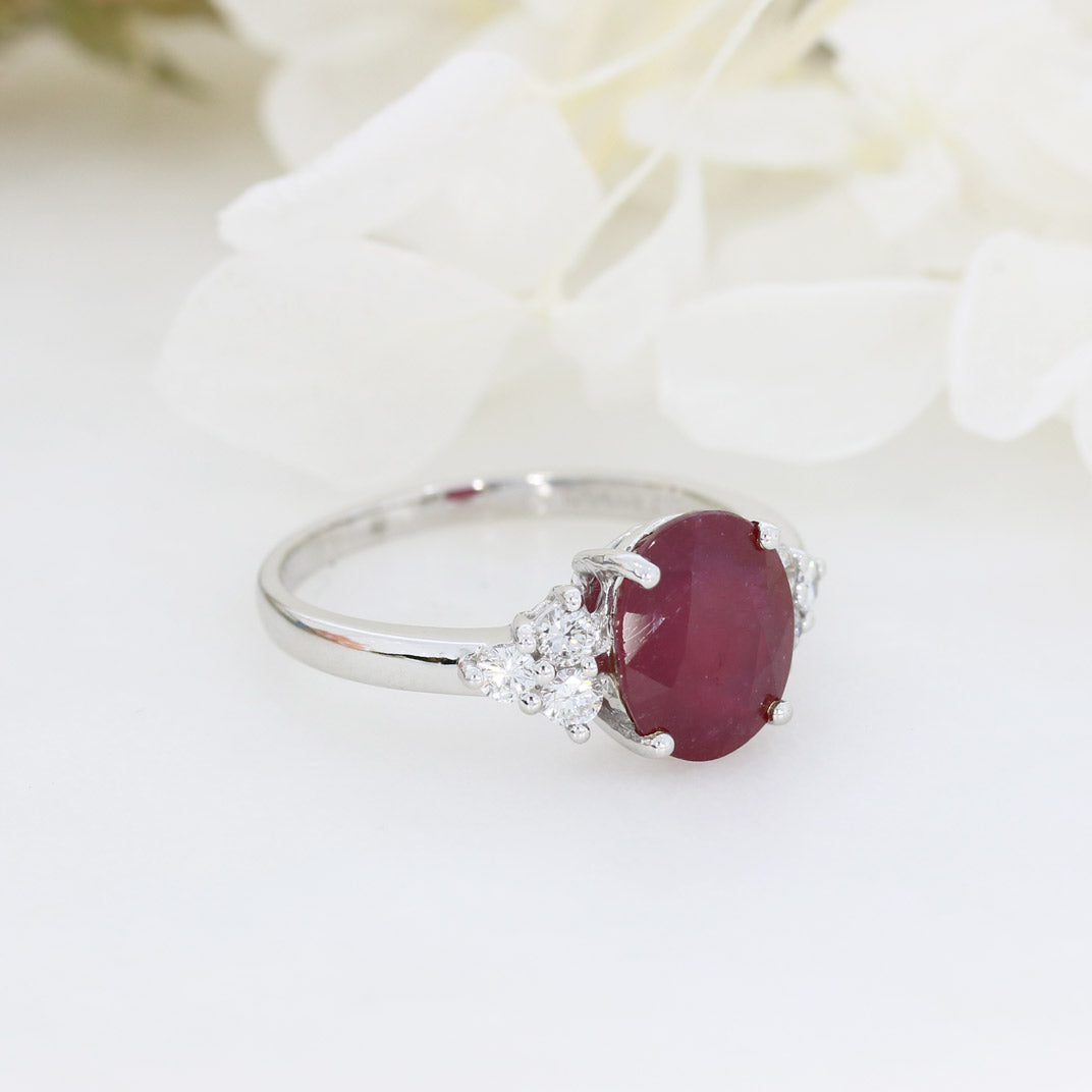 9ct White gold oval glass filled ruby and diamond dress ring