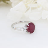 9ct White gold oval glass filled ruby and diamond dress ring