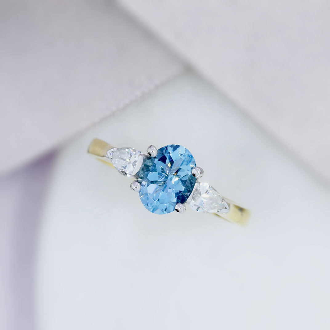 18ct Gold Aquamarine & Pear Shaped Diamond Three Stone Ring