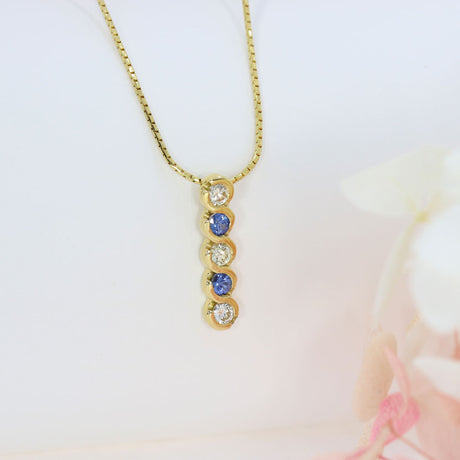 18ct Gold 5 Stone Sapphire & Diamond Drop Pendant on an 18ct 18inch Snake Chain