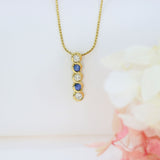 18ct Gold 5 Stone Sapphire & Diamond Drop Pendant on an 18ct 18inch Snake Chain
