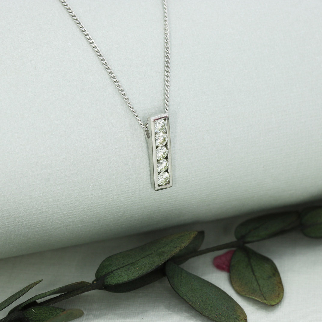 18ct White Gold Bar Pendant Set With 5 Round Diamonds 0.55ct On 18ct Curb Chain