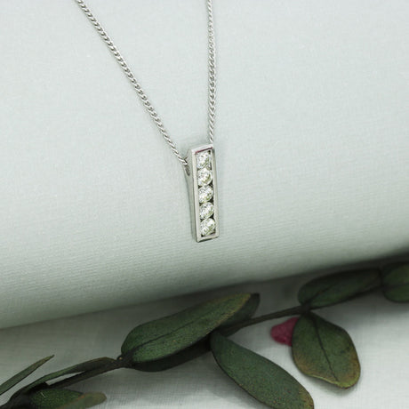 18ct White Gold Bar Pendant Set With 5 Round Diamonds 0.55ct On 18ct Curb Chain