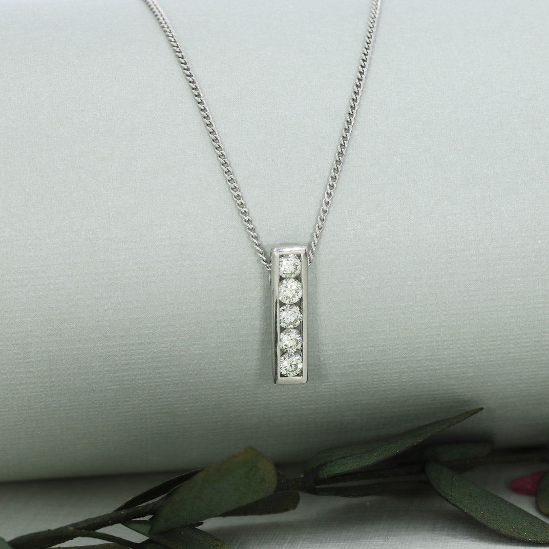 18ct White Gold Bar Pendant Set With 5 Round Diamonds 0.55ct On 18ct Curb Chain