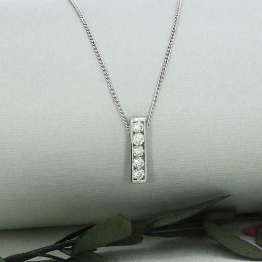 18ct White Gold Bar Pendant Set With 5 Round Diamonds 0.55ct On 18ct Curb Chain
