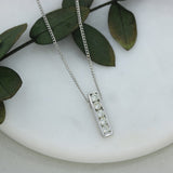 18ct White Gold Bar Pendant Set With 5 Round Diamonds 0.55ct On 18ct Curb Chain