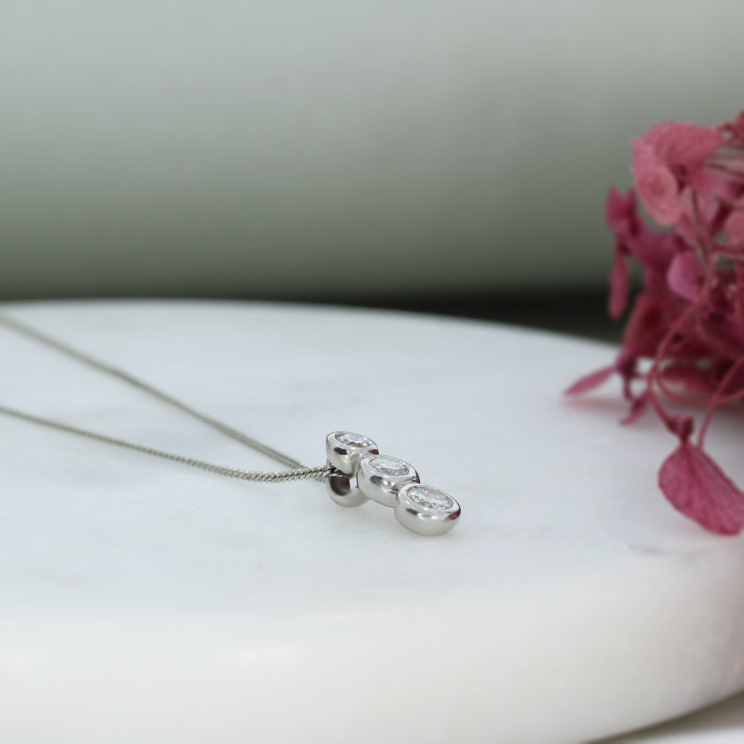 18ct White Gold 3 Stone Diamond Pendant on an 18ct White Gold Chain
