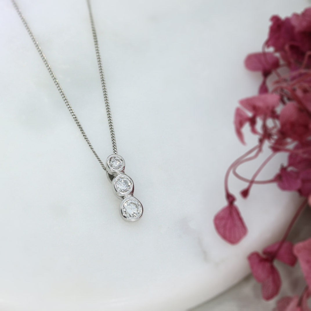 18ct White Gold 3 Stone Diamond Pendant on an 18ct White Gold Chain