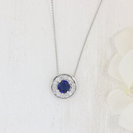 18ct White Gold Round Sapphire and Diamond Cluster Halo Pendant On a 18ct 18" Chain