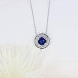 18ct White Gold Round Sapphire and Diamond Cluster Halo Pendant On a 18ct 18" Chain