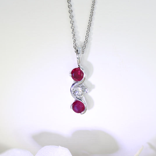9ct White Gold Ruby and Diamond 3 Stone Pendant On a 18inch 9ct Chain