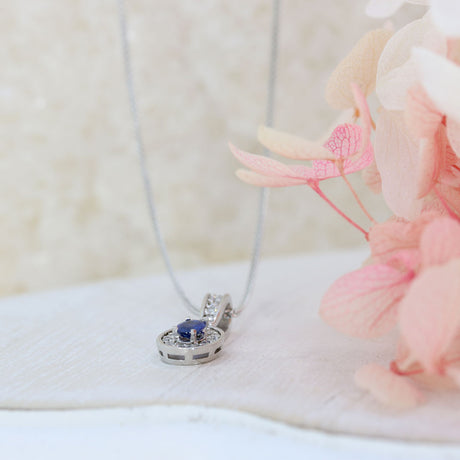 18ct White Gold Sapphire and Diamond Oval Cluster Pendant On a 18ct 18" Chain