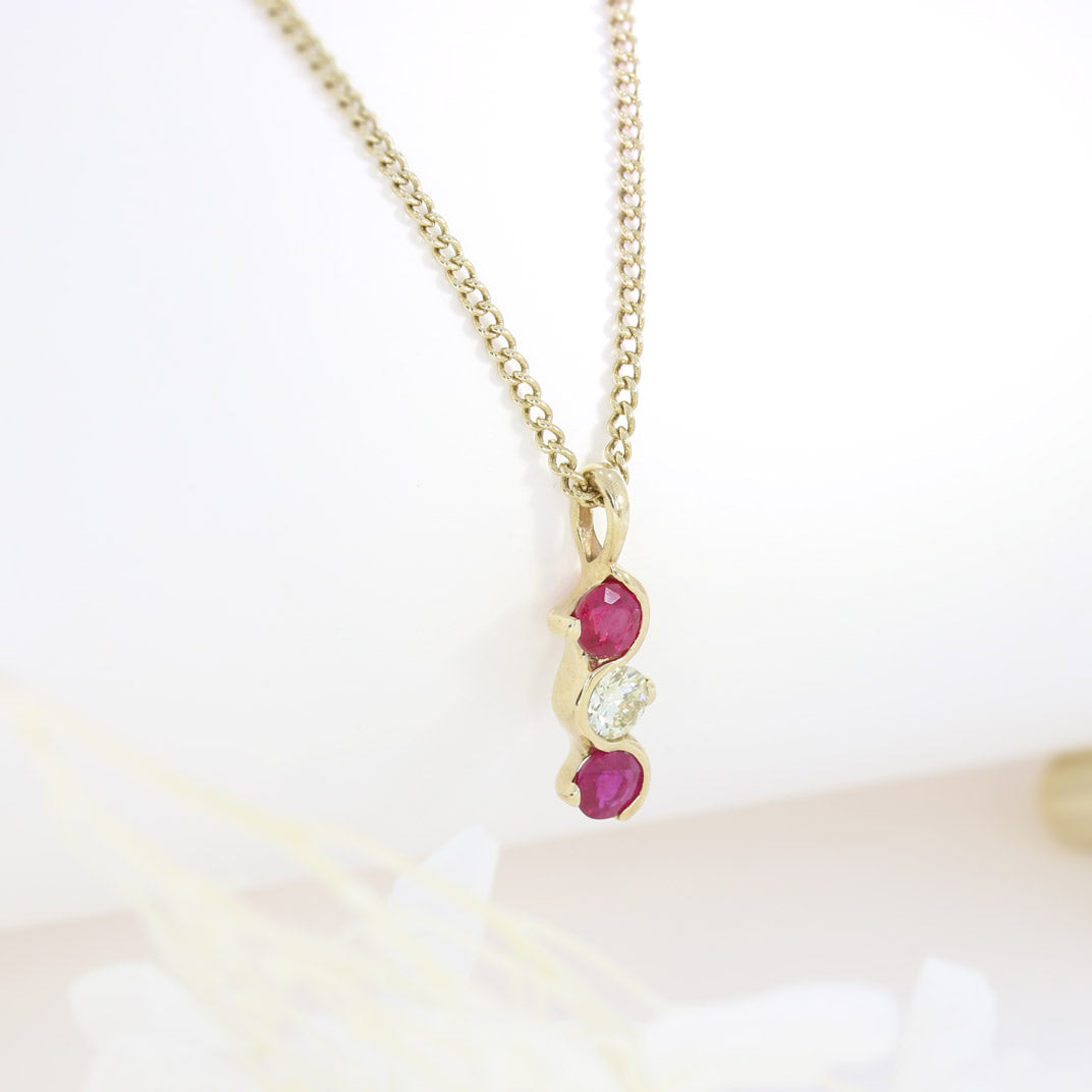9ct Yellow Gold Ruby and Diamond Wave Style 3 Stone Pendant on a 9ct Yellow Gold 19" Chain