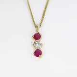 9ct Yellow Gold Ruby and Diamond Wave Style 3 Stone Pendant on a 9ct Yellow Gold 19" Chain
