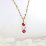 9ct Yellow Gold Ruby and Diamond Wave Style 3 Stone Pendant on a 9ct Yellow Gold 19" Chain
