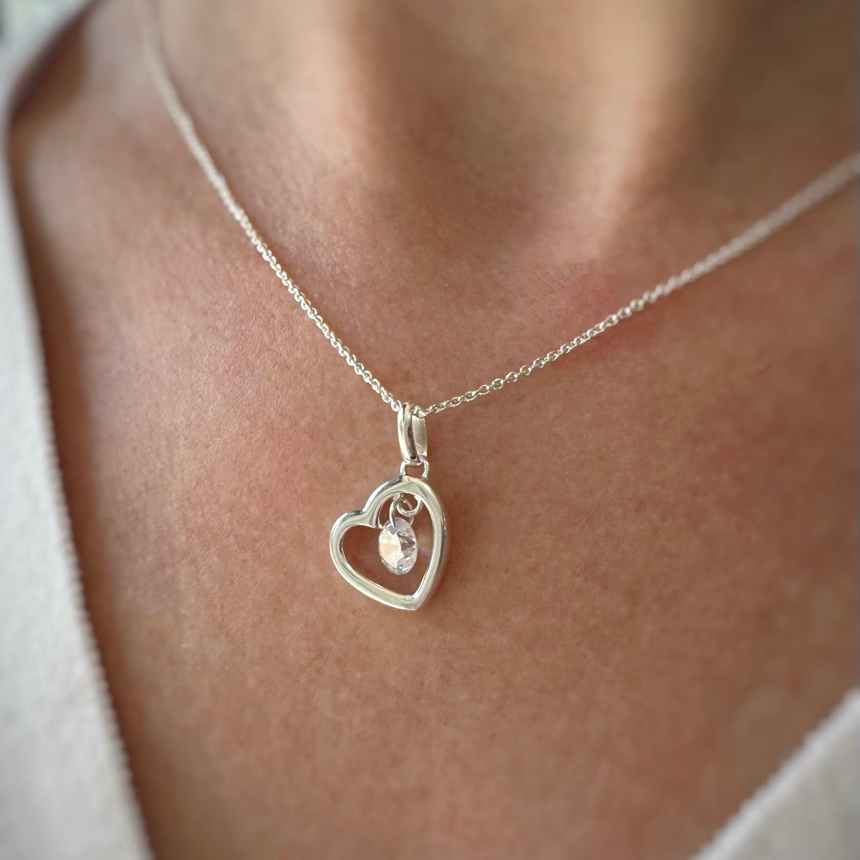 Silver Open Heart Pendant With Suspended CZ