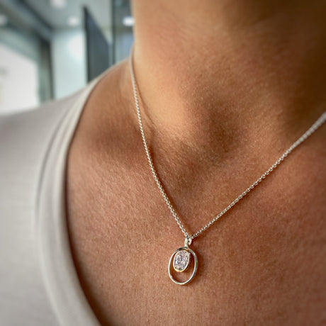 Silver Oval Cubic Zirconia Pendant with Rose Gold Accent