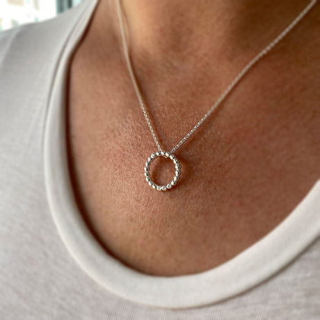 Silver Open Beaded Circle Pendant With Cubic Zirconia's