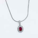 18ct White Gold Ruby & Diamond Halo Pendant On an 18ct 16" Snake Chain