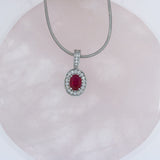 18ct White Gold Ruby & Diamond Halo Pendant On an 18ct 16" Snake Chain