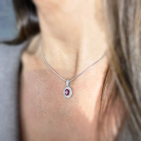 18ct White Gold Ruby & Diamond Halo Pendant On an 18ct 16" Snake Chain
