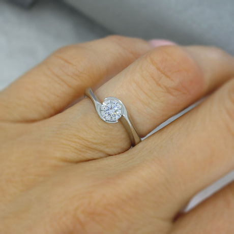 Pre Owned Platinum Certified Diamond Solitaire Ring in a Crossover Setting 0.70ct F VVS